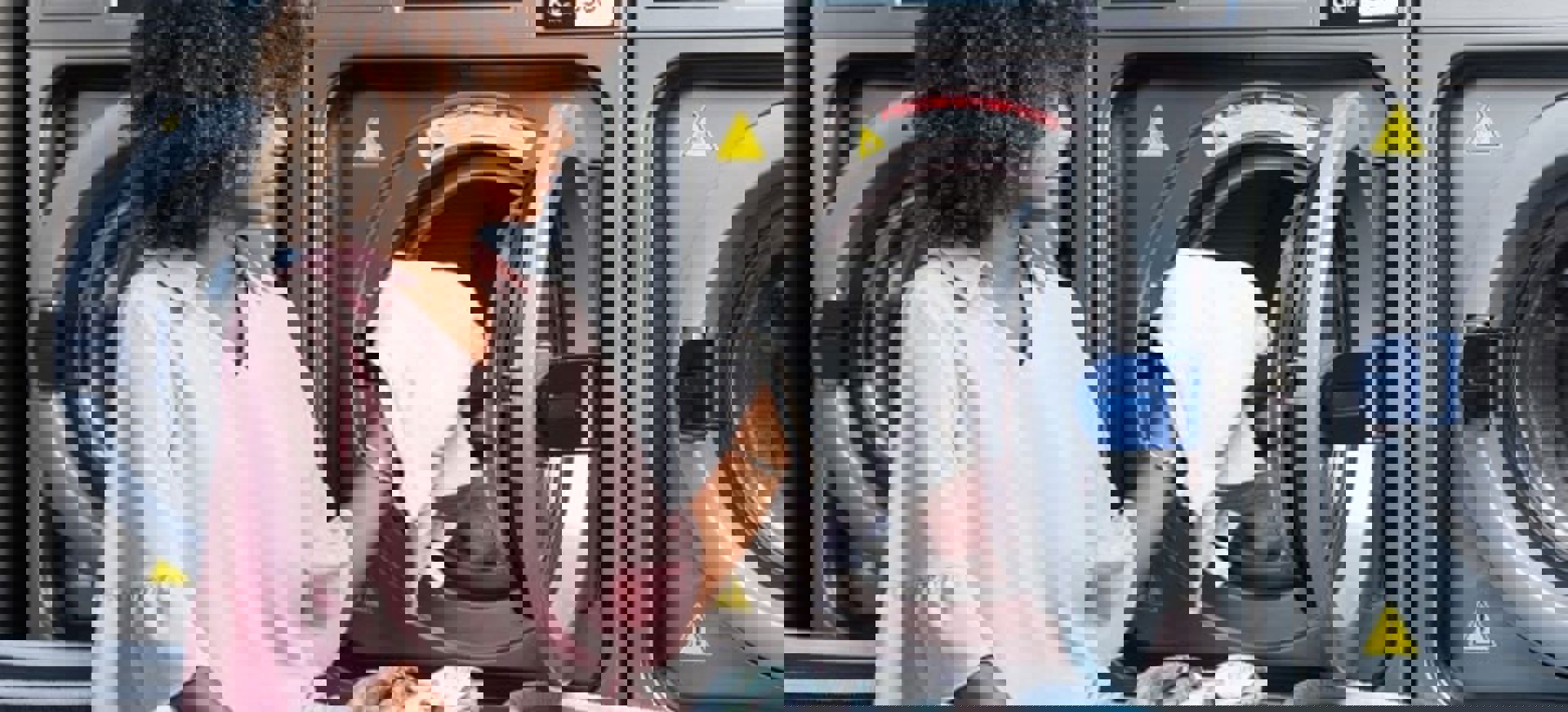 Woman Loading Washing Machine At Laundromat Min 5