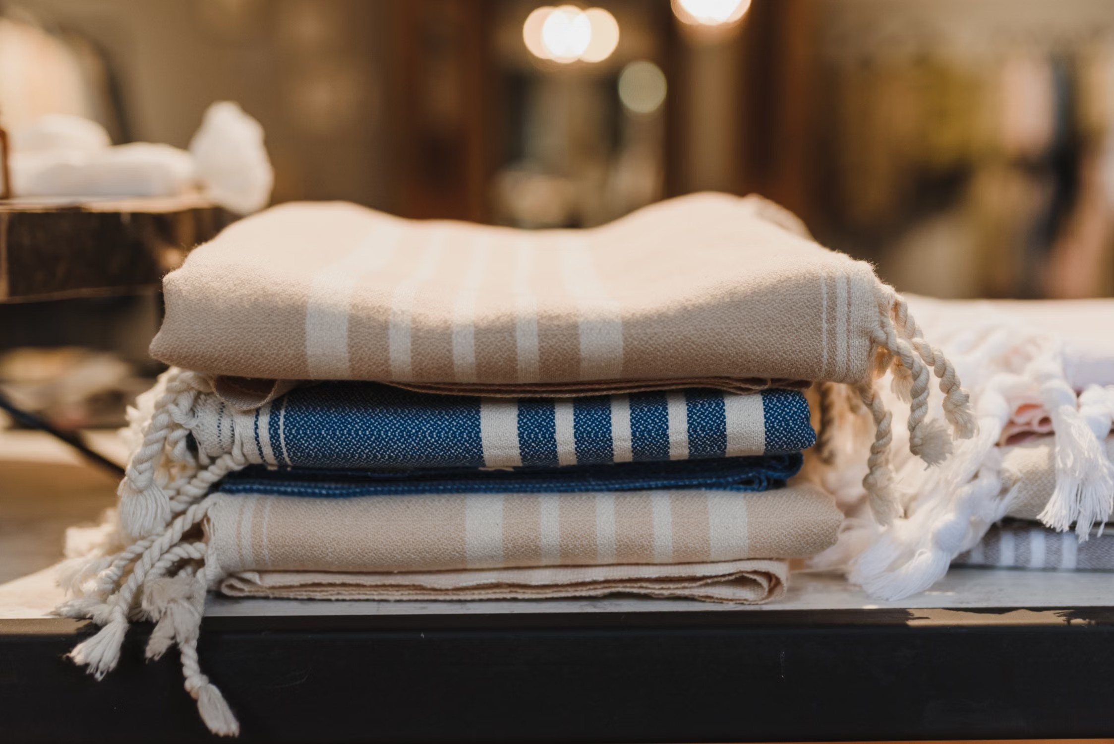 Stock photo of neatly folded striped household textiles.